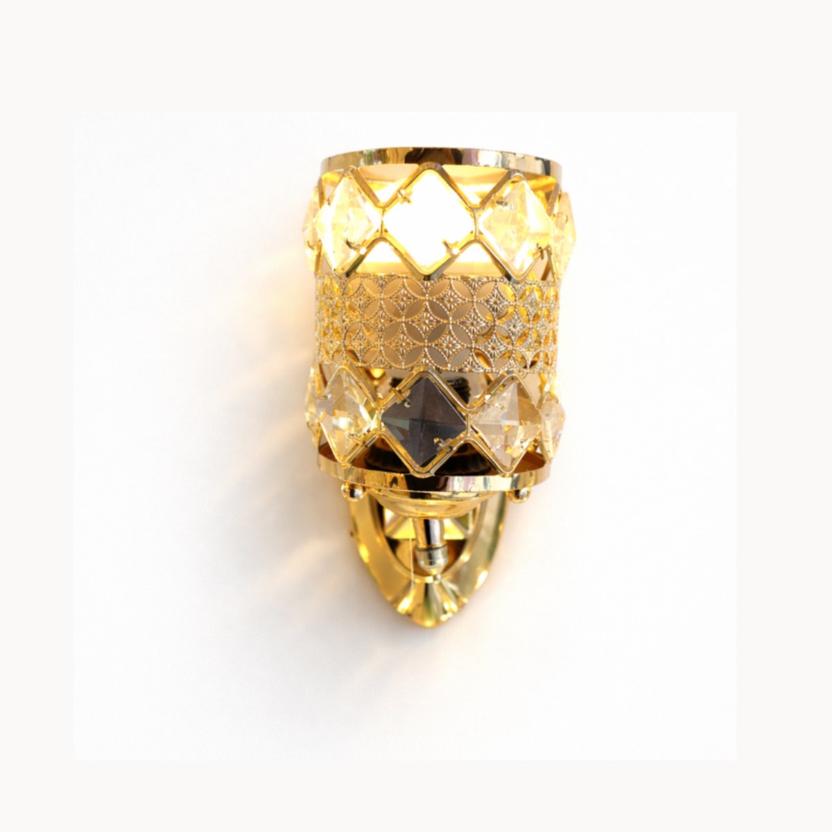 Gold wall sconce with textured design on a white background