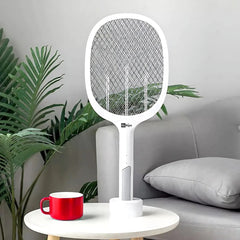 USB rechargeable mosquito killer racket placed on a table. 1
